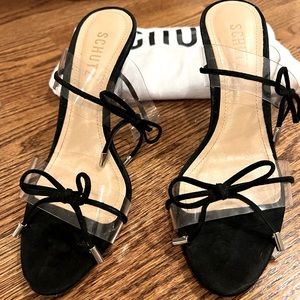 Schultz black / clear heels